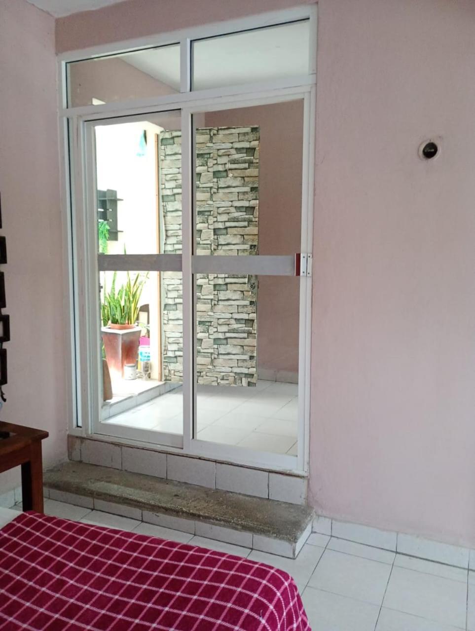 En Planta Alta A Pie De Avenida Apartment Cozumel Bagian luar foto